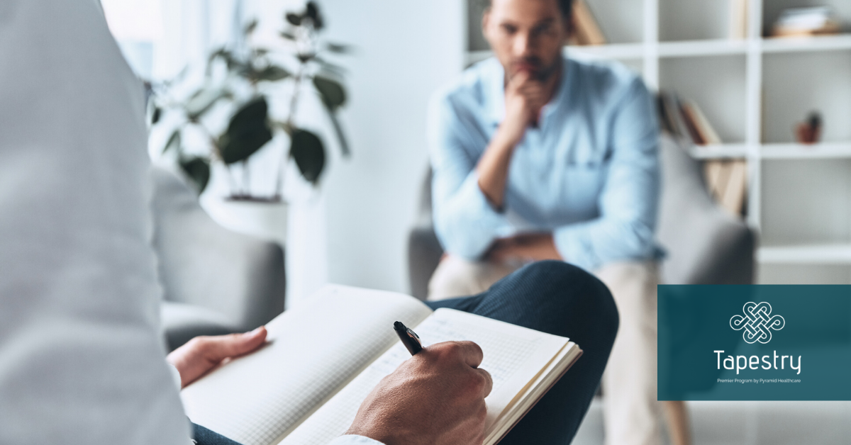 Therapist preparing to take notes during a session