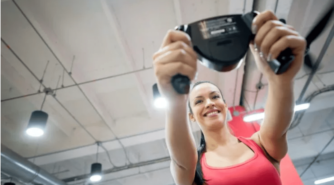 Woman smiling holding a controller