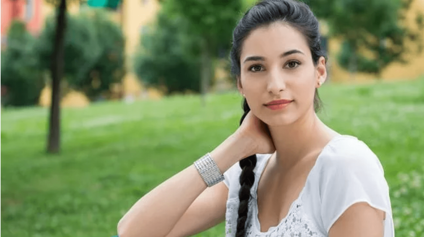 Young adult woman looking into the camera for a portrait