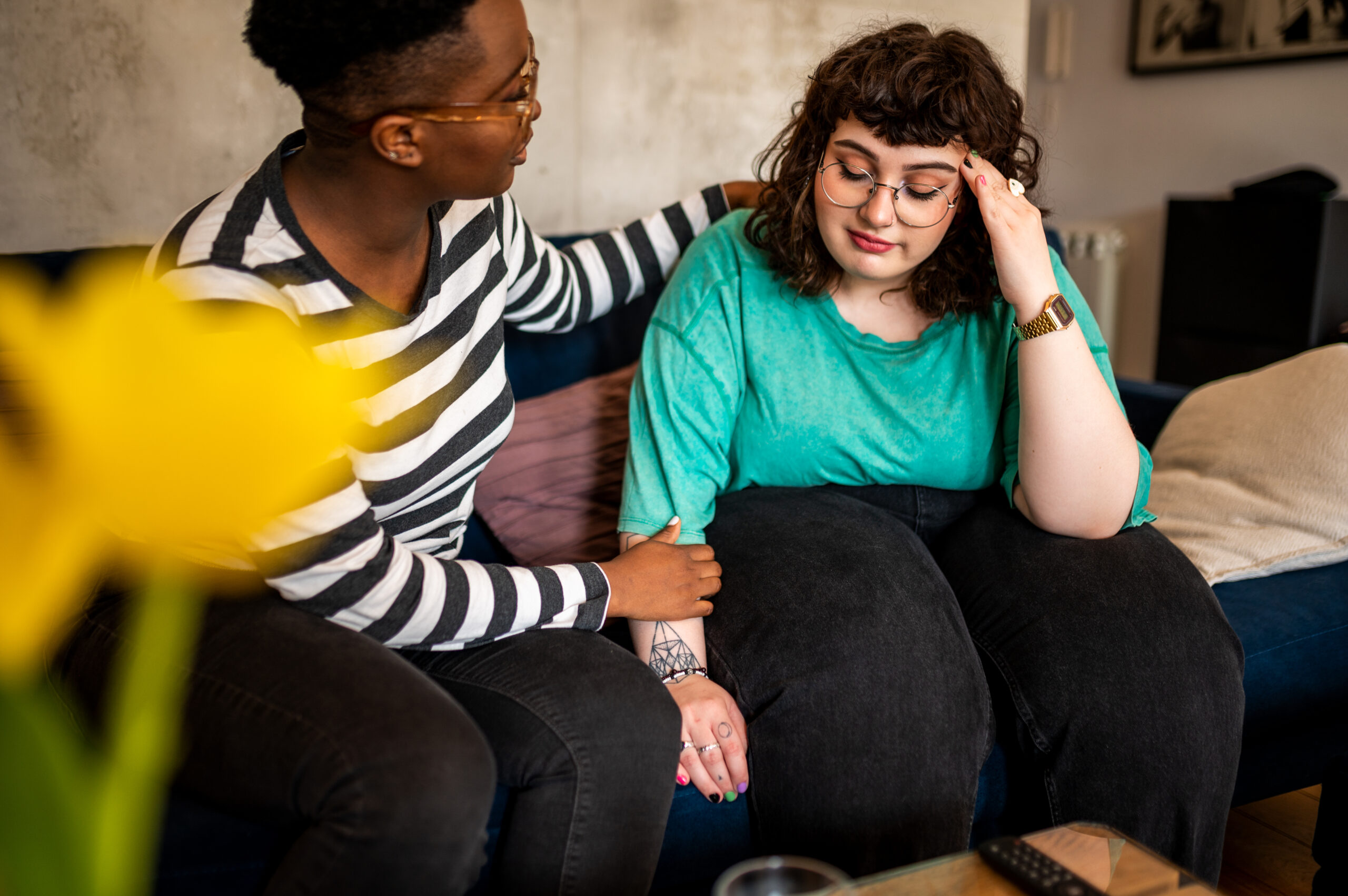 Two women in the living room talking