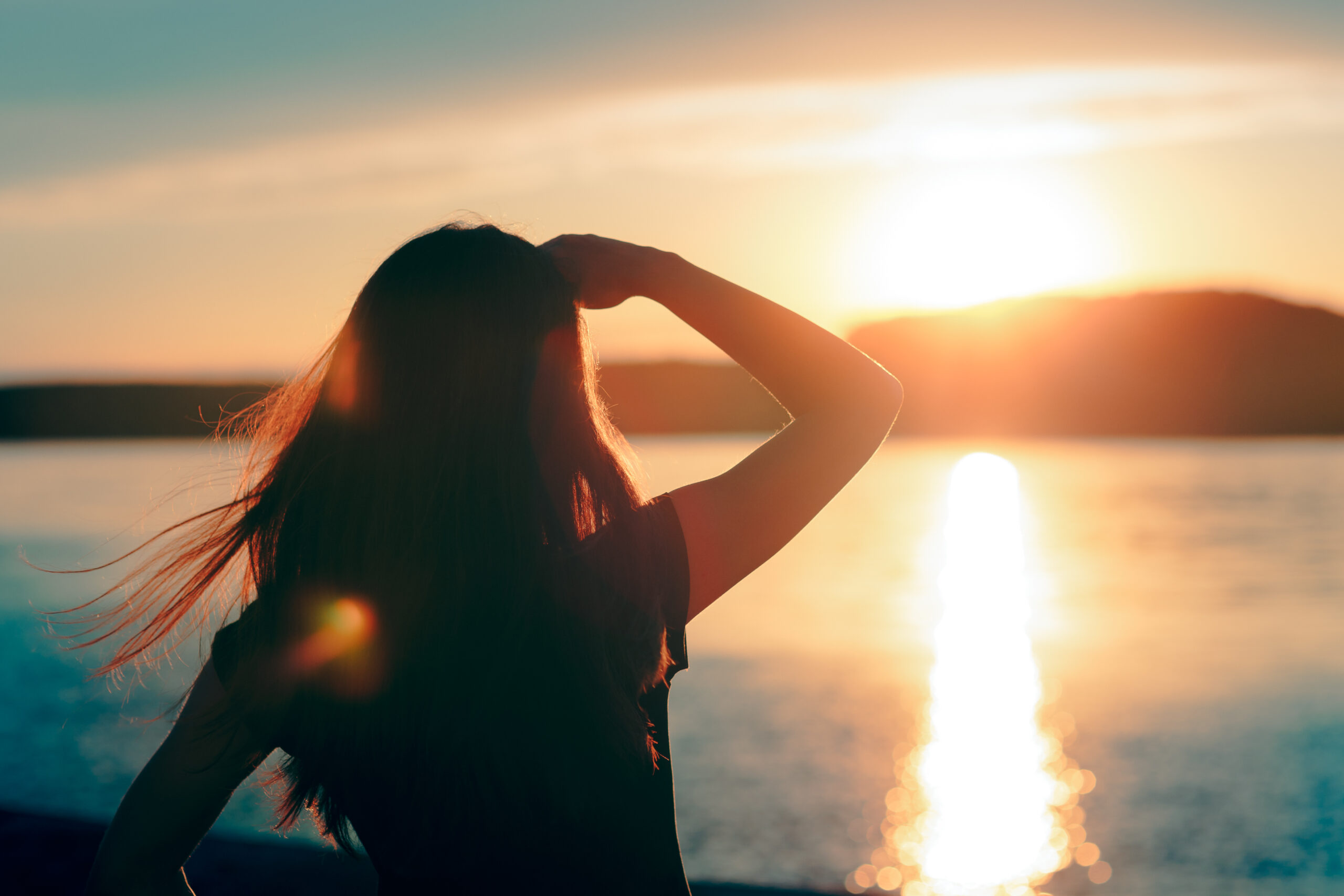 A girl dreaming and looking at the horizon