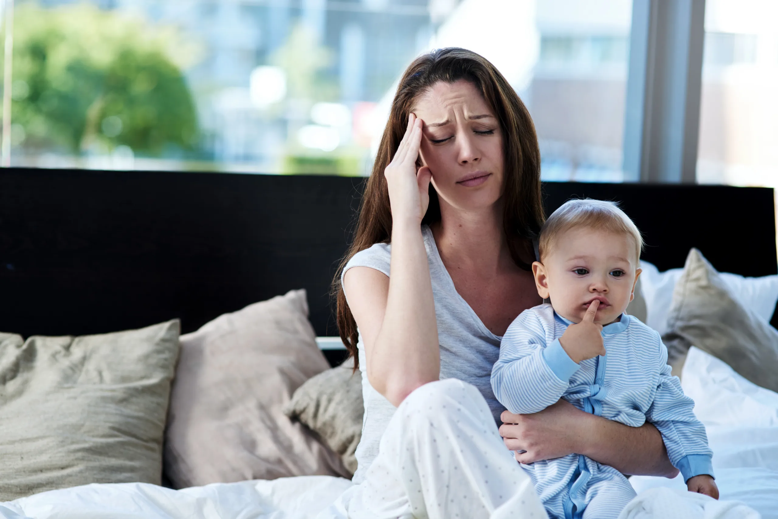 Moments in motherhood. Shot of a mother and her baby boy at home